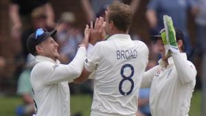 England's wicketkeeper Jos Buttler, right, Stuart Board, center, and Joe Root celebrate a wicket.(AP) England's wicketkeeper Jos Buttler, right, Stuart Board, center, and Joe Root celebrate a wicket.(AP)