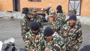 Nepalese army personnel prepare to leave for the search and rescue operation.(Reuters Image) Nepalese army personnel prepare to leave for the search and rescue operation.(Reuters Image)