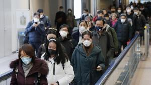 Passengers arriving from the Chinese city of Wuhan arrive at Narita Airport in Chiba, Japan.(REUTERS) Passengers arriving from the Chinese city of Wuhan arrive at Narita Airport in Chiba, Japan.(REUTERS)