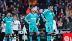 Barcelona's Lionel Messi and Frenkie de Jong look dejected after Maxi Gomez scored Valencia's second goal.(REUTERS) Barcelona's Lionel Messi and Frenkie de Jong look dejected after Maxi Gomez scored Valencia's second goal.(REUTERS)