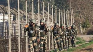 Border Security Force (BSF) soldiers patrol along the India-Pakistan border, ahead of Republic Day 2020 at RS Pura about 35 km from Jammu.(PTI Photo/Representative)