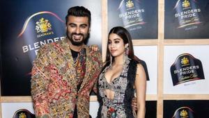 Janhvi Kapoor shared a picture with Arjun Kapoor from the fashion show.
