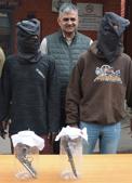 The accused along with seized weapons in police custody.(SANT ARORA/HT) The accused along with seized weapons in police custody.(SANT ARORA/HT)