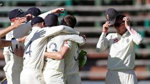England's Mark Wood celebrates with Joe Root teammates.(REUTERS) England's Mark Wood celebrates with Joe Root teammates.(REUTERS)