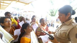 A police personnel checks the age proof of women devotees at the Pamba base camp of Sabarimala Temple(Vivek R Nair / HT File) A police personnel checks the age proof of women devotees at the Pamba base camp of Sabarimala Temple(Vivek R Nair / HT File)