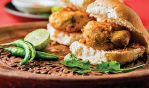 The consensus is that vada pav became popular in the mid to late 1970s in suburban Mumbai, often at train stations(Shutterstock) The consensus is that vada pav became popular in the mid to late 1970s in suburban Mumbai, often at train stations(Shutterstock)