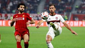 Flamengo's Pablo Mari in action with Liverpool's Mohamed Salah(REUTERS) Flamengo's Pablo Mari in action with Liverpool's Mohamed Salah(REUTERS)