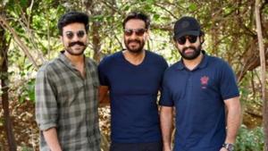 Ram Charan, Ajay Devgn and Jr NTR pose together.(Twitter) Ram Charan, Ajay Devgn and Jr NTR pose together.(Twitter)