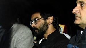 JNU student Sharjeel Imam with Crime branch officials after his arrest from Bihar, on January 29, 2020.(Biplov Bhuyan/HT Photo) JNU student Sharjeel Imam with Crime branch officials after his arrest from Bihar, on January 29, 2020.(Biplov Bhuyan/HT Photo)