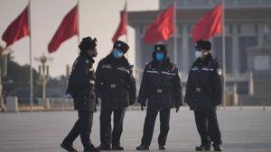 Police officers wearing masks are seen at at the Tiananmen Square, as the country is hit by an epidemic of the new coronavirus, in Beijing, China.(REUTERS) Police officers wearing masks are seen at at the Tiananmen Square, as the country is hit by an epidemic of the new coronavirus, in Beijing, China.(REUTERS)