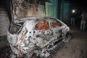 A charred vehicles after clashes between two groups during an immersion procession of goddess Saraswati at Ashok Raj Path, in Patna, Friday, Jan. 31, 2020.(Santosh Kumar / HT Photo) A charred vehicles after clashes between two groups during an immersion procession of goddess Saraswati at Ashok Raj Path, in Patna, Friday, Jan. 31, 2020.(Santosh Kumar / HT Photo)