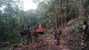 An Excavator cutting through the Hantalaguda hill in the Maoist citadel of Swabhiman Anchala of Malkangiri district to build a road for the first time in 70 years.(HT Photo) An Excavator cutting through the Hantalaguda hill in the Maoist citadel of Swabhiman Anchala of Malkangiri district to build a road for the first time in 70 years.(HT Photo)