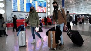 Foreign travellers wearing masks walk past a departures information board at Beijing International Airport in Beijing, China as the country is hit by an outbreak of the new coronavirus, February 1, 2020. REUTERS/Jason Lee(REUTERS) Foreign travellers wearing masks walk past a departures information board at Beijing International Airport in Beijing, China as the country is hit by an outbreak of the new coronavirus, February 1, 2020. REUTERS/Jason Lee(REUTERS)