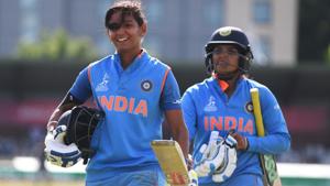 Harmanpreet Kaur and Veda Krishnamurthy of India walk off the pitch.(Getty Images)