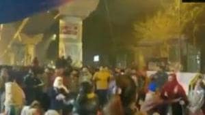 Many people, including students, have started gathered outside the Jamia Nagar police station late on Sunday night.(ANI PHOTO.) Many people, including students, have started gathered outside the Jamia Nagar police station late on Sunday night.(ANI PHOTO.)