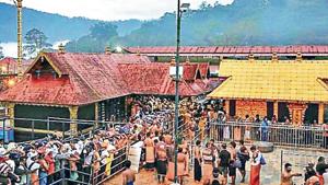 Devotees queue up inside Sabarimala temple premises.(Reuters) Devotees queue up inside Sabarimala temple premises.(Reuters)