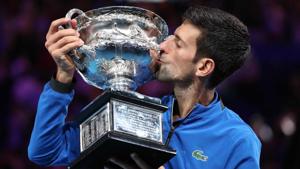 Serbia's Novak Djokovic kisses his trophy after winning the match against Spain's Rafael Nadal.(REUTER) Serbia's Novak Djokovic kisses his trophy after winning the match against Spain's Rafael Nadal.(REUTER)