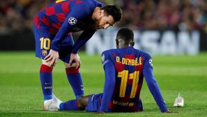Barcelona's Lionel Messi talks to Ousmane Dembele as he is down injured.(REUTERS) Barcelona's Lionel Messi talks to Ousmane Dembele as he is down injured.(REUTERS)