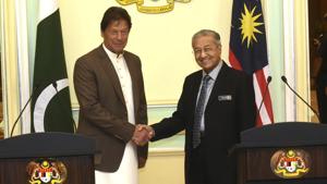This handout photo taken and released by Malaysia's Ministry of Information shows Pakistan's Prime Minister Imran Khan shakes hands with Malaysia's Prime Minister Mahathir Mohamad after a joint news conference, Tuesday, Feb. 4, 2020, in Putrajaya, Malaysia. (Malaysia's Ministry of Information via AP)(AP) This handout photo taken and released by Malaysia's Ministry of Information shows Pakistan's Prime Minister Imran Khan shakes hands with Malaysia's Prime Minister Mahathir Mohamad after a joint news conference, Tuesday, Feb. 4, 2020, in Putrajaya, Malaysia. (Malaysia's Ministry of Information via AP)(AP)