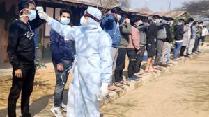 A medical staff scans the temperature of Indian National who arrived from coronavirus-hit Wuhan, put for medical observation, at quarantine center, in Manesar on Monday. (ANI Photo) A medical staff scans the temperature of Indian National who arrived from coronavirus-hit Wuhan, put for medical observation, at quarantine center, in Manesar on Monday. (ANI Photo)