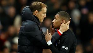 Paris St Germain's Kylian Mbappe speaks to coach Thomas Tuchel as he comes off as a substitute.(REUTERS) Paris St Germain's Kylian Mbappe speaks to coach Thomas Tuchel as he comes off as a substitute.(REUTERS)