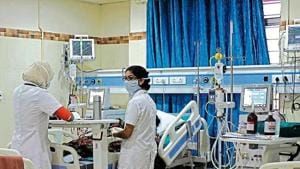 Nurses wear masks and gloves to avoid spreading infection at the intensive care unit (ICU) of the Government Medical College in Ernakulam, Kerala.(courtesy mansi thapliy) Nurses wear masks and gloves to avoid spreading infection at the intensive care unit (ICU) of the Government Medical College in Ernakulam, Kerala.(courtesy mansi thapliy)