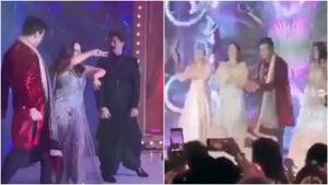 Karan Johar, Gauri Khan and Shah Rukh Khan performing at the reception. Karan Johar, Gauri Khan and Shah Rukh Khan performing at the reception.