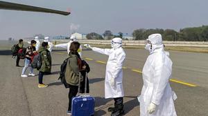 Medics screen Indian nationals after they were brought by an Air India aircraft from China's coronavirus-hit city of Wuhan, at the airport in New Delhi on February 2, 2020.(PTI File Photo) Medics screen Indian nationals after they were brought by an Air India aircraft from China's coronavirus-hit city of Wuhan, at the airport in New Delhi on February 2, 2020.(PTI File Photo)