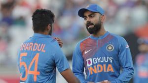 File image: India's Shardul Thakur (L) speaks with teammate Virat Kohli (R)(AFP) File image: India's Shardul Thakur (L) speaks with teammate Virat Kohli (R)(AFP)