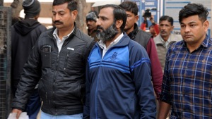 Mahipal Singh being taken to the police station. (Praveen Kumar/HT Photo) Mahipal Singh being taken to the police station. (Praveen Kumar/HT Photo)