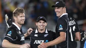 Black Caps, from left, James Neesham, Tom Latham and Kyle Jamieson celebrate their win over India.(AP) Black Caps, from left, James Neesham, Tom Latham and Kyle Jamieson celebrate their win over India.(AP)