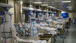 Medical workers in protective suits attend to novel coronavirus patients at the intensive care unit (ICU) of a designated hospital in Wuhan, Hubei province, China on February 6, 2020.(Reuters File Photo) Medical workers in protective suits attend to novel coronavirus patients at the intensive care unit (ICU) of a designated hospital in Wuhan, Hubei province, China on February 6, 2020.(Reuters File Photo)