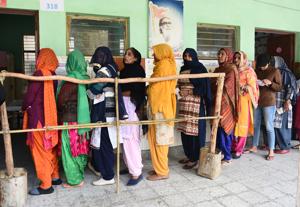 New Delhi, India - February 8, 2020: Women stand in a queue to cast their votes during Vidhan Sabha elections, at a school in Chhaniwalaa village, Najafgarh, in New Delhi, India, on Saturday, February 8, 2020. (Photo by Vipin Kumar / Hindustan Times)(Vipin Kumar/HT PHOTO) New Delhi, India - February 8, 2020: Women stand in a queue to cast their votes during Vidhan Sabha elections, at a school in Chhaniwalaa village, Najafgarh, in New Delhi, India, on Saturday, February 8, 2020. (Photo by Vipin Kumar / Hindustan Times)(Vipin Kumar/HT PHOTO)