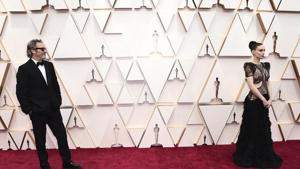 Joaquin Phoenix, left, and Rooney Mara arrive at the Oscars on Sunday.(Jordan Strauss/Invision/AP) Joaquin Phoenix, left, and Rooney Mara arrive at the Oscars on Sunday.(Jordan Strauss/Invision/AP)