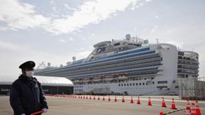 A man wearing a mask stands guard at the port next to the cruise ship Diamond Princess at Daikoku Pier Cruise Terminal in Yokohama, south of Tokyo, Japan February 12, 2020.(REUTERS) A man wearing a mask stands guard at the port next to the cruise ship Diamond Princess at Daikoku Pier Cruise Terminal in Yokohama, south of Tokyo, Japan February 12, 2020.(REUTERS)