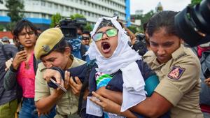 A protestor being detained by police personnel as she defies the prohibitory orders imposed in the area, during a rally against the amended Citizenship Act, in Bengaluru, Thursday, Dec. 19, 2019.(PTI File) A protestor being detained by police personnel as she defies the prohibitory orders imposed in the area, during a rally against the amended Citizenship Act, in Bengaluru, Thursday, Dec. 19, 2019.(PTI File)