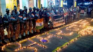 Members of Sewa Sankalp Yuva Sangathan light lamps to pay tributes to the martyrs of Pulwama terror attack on the first anniversary of the incident in Bhopal on Thursday. (ANI Photo) Members of Sewa Sankalp Yuva Sangathan light lamps to pay tributes to the martyrs of Pulwama terror attack on the first anniversary of the incident in Bhopal on Thursday. (ANI Photo)