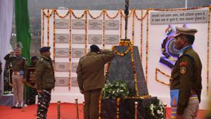 Senior police officer pays tribute to the 40 paramilitary Central Reserve Police Force (CRPF) personnel who were killed in the Pulwama terror attack in February last year, at CRPF battalion headquarter, Lethpoea, Pulwama, Srinagar, Jammu and Kashmir on Febraury 14, 2020.(Waseem Andrabi/HT Photo) Senior police officer pays tribute to the 40 paramilitary Central Reserve Police Force (CRPF) personnel who were killed in the Pulwama terror attack in February last year, at CRPF battalion headquarter, Lethpoea, Pulwama, Srinagar, Jammu and Kashmir on Febraury 14, 2020.(Waseem Andrabi/HT Photo)