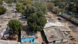 A view of a slum area where a wall was built as part of a beautification drive along a route in Ahmedabad that U.S. President Donald Trump will be taking during his visit next week.(REUTERS) A view of a slum area where a wall was built as part of a beautification drive along a route in Ahmedabad that U.S. President Donald Trump will be taking during his visit next week.(REUTERS)