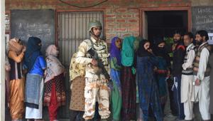 Paramilitary soldier stands guard as Kashmiri voters wait in a queue to cast their votes during the third phase of election in shangus in south Kashmirs Anantnag district on April 23, 2019.(Waseem Andrabi/HT File Photo) Paramilitary soldier stands guard as Kashmiri voters wait in a queue to cast their votes during the third phase of election in shangus in south Kashmirs Anantnag district on April 23, 2019.(Waseem Andrabi/HT File Photo)