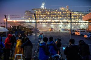 A bus arrives near the cruise ship Diamond Princess, where dozens of passengers were tested positive for coronavirus, at Daikoku Pier Cruise Terminal in Yokohama, south of Tokyo, Japan on February 16, 2020.(Reuters File Photo) A bus arrives near the cruise ship Diamond Princess, where dozens of passengers were tested positive for coronavirus, at Daikoku Pier Cruise Terminal in Yokohama, south of Tokyo, Japan on February 16, 2020.(Reuters File Photo)