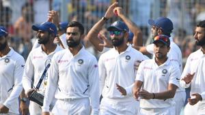 India's cricket team captain Virat Kohli (C) does a victory lap of the ground along with teammates after India won the third day of the second Test cricket match of a two-match series between India and Bangladesh at the Eden Gardens cricket stadium in Kolkata.(AFP) India's cricket team captain Virat Kohli (C) does a victory lap of the ground along with teammates after India won the third day of the second Test cricket match of a two-match series between India and Bangladesh at the Eden Gardens cricket stadium in Kolkata.(AFP)