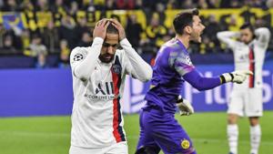 PSG's Neymar reacts disappointed beside Dortmund's goalkeeper Roman Buerki(AP) PSG's Neymar reacts disappointed beside Dortmund's goalkeeper Roman Buerki(AP)