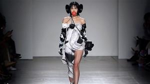 A prestigious New York fashion college apologized on Wednesday after a catwalk featuring models wearing large prosthetic red lips, ears and bushy eyebrows was branded racist.(Instagram) A prestigious New York fashion college apologized on Wednesday after a catwalk featuring models wearing large prosthetic red lips, ears and bushy eyebrows was branded racist.(Instagram)