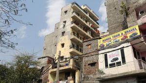 According to officials, the building is situated in front of Jawaharlal Nehru University’s north gate, they said.(HT Photo) According to officials, the building is situated in front of Jawaharlal Nehru University’s north gate, they said.(HT Photo)