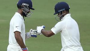 Indian cricketer Rishabh Pant, right, and Ajinkya Rahane(AP)