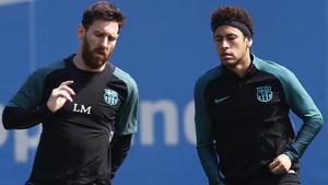 File image: Lionel Messi, left, and Neymar attend a training session.(AP) File image: Lionel Messi, left, and Neymar attend a training session.(AP)