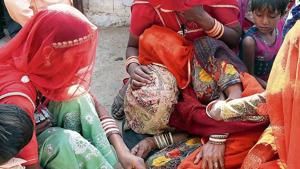 Mother of one of the victims is consoled by the neighbours at her home in Nagaur district of Rajasthan on Friday.(Himanshu Vyas/ht photo) Mother of one of the victims is consoled by the neighbours at her home in Nagaur district of Rajasthan on Friday.(Himanshu Vyas/ht photo)