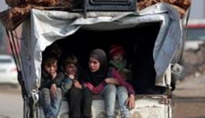 FILE PHOTO: Displaced Syrians from northwest Syria ride on a back of a truck with belongings, in Azaz, Syria(REUTERS) FILE PHOTO: Displaced Syrians from northwest Syria ride on a back of a truck with belongings, in Azaz, Syria(REUTERS)