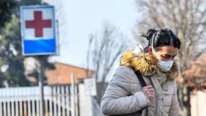 A woman wearing a face mask leaves the hospital of Codogno amid a coronavirus outbreak in northern Italy, in Codogno, Italy.(Reuters Photo) A woman wearing a face mask leaves the hospital of Codogno amid a coronavirus outbreak in northern Italy, in Codogno, Italy.(Reuters Photo)